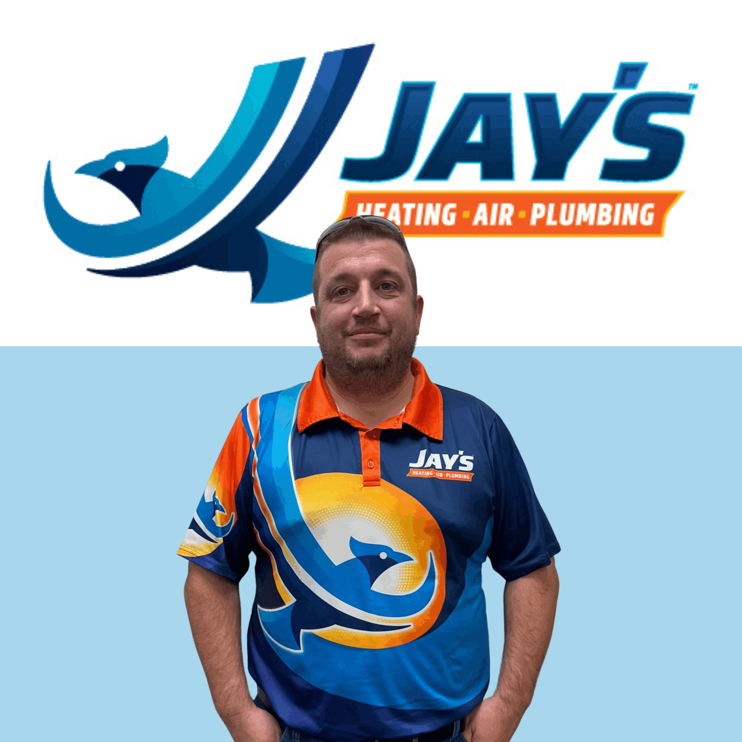 Man wearing a Jays Heating Air Plumbing shirt stands in front of the company logo, which features a stylized bird and bold text.