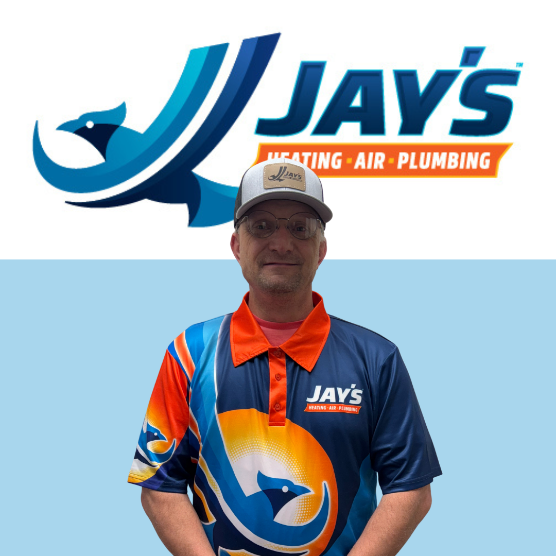 Man wearing a Jay's Heating, Air, Plumbing shirt and cap stands in front of the company logo on a blue background.