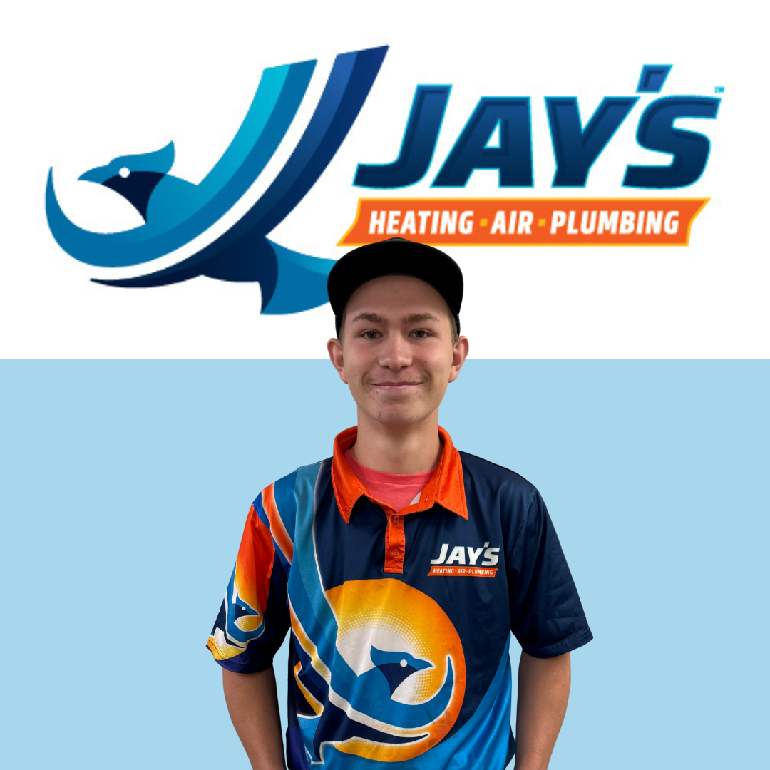 A young man in a colorful Jay’s Heating, Air, Plumbing uniform stands in front of the company logo, which features a stylized bird and bold lettering.