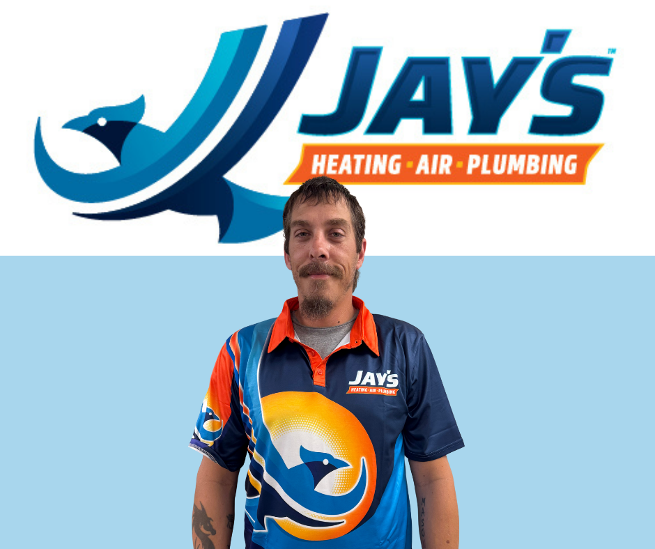 A man in a branded Jay’s Heating, Air, Plumbing shirt stands in front of a Jay’s company logo on a blue and white background, representing the team of 5-Star Technicians known for their top-notch service.