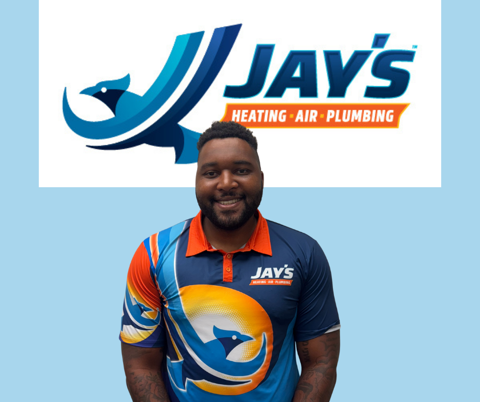 A man in a colorful Jay’s Heating, Air & Plumbing shirt stands smiling in front of the company’s logo on a light blue background, showcasing their 5-Star Technicians and commitment to exceptional service.